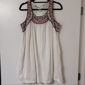 White dress with colorful accents